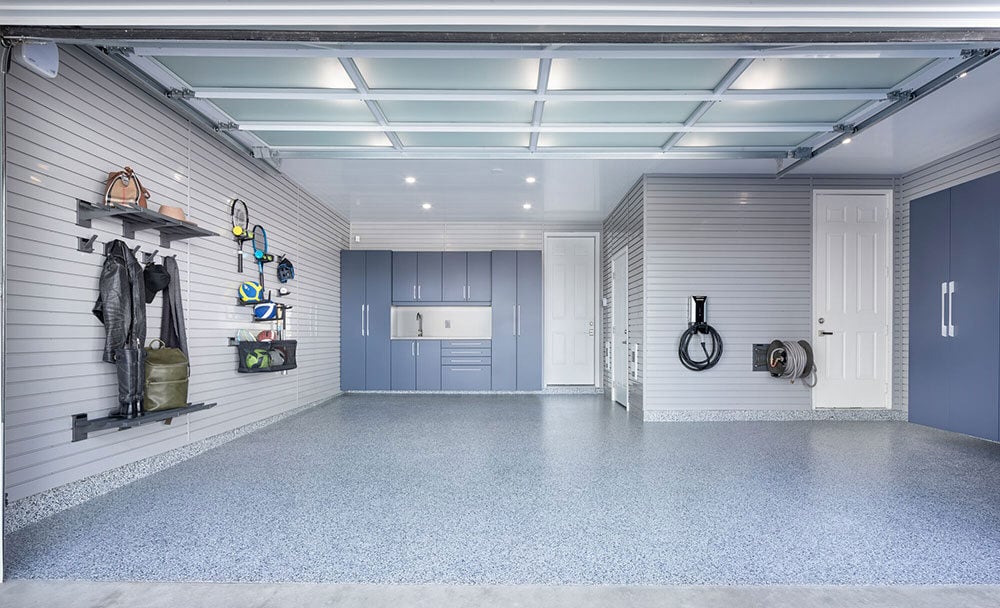 Garage transformation cabinets slatwall accessories bike racks - Garage Living