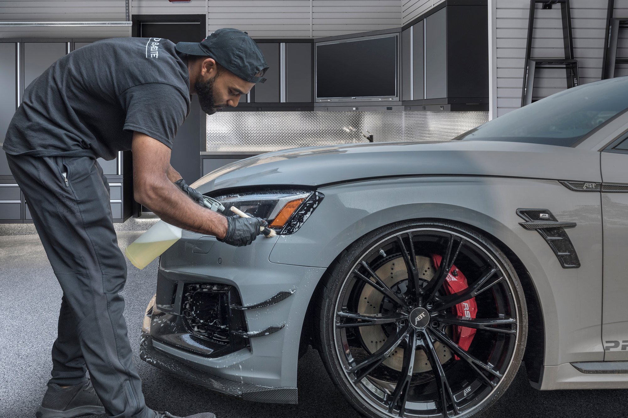 Detailing of the car in the garage by Garage Living