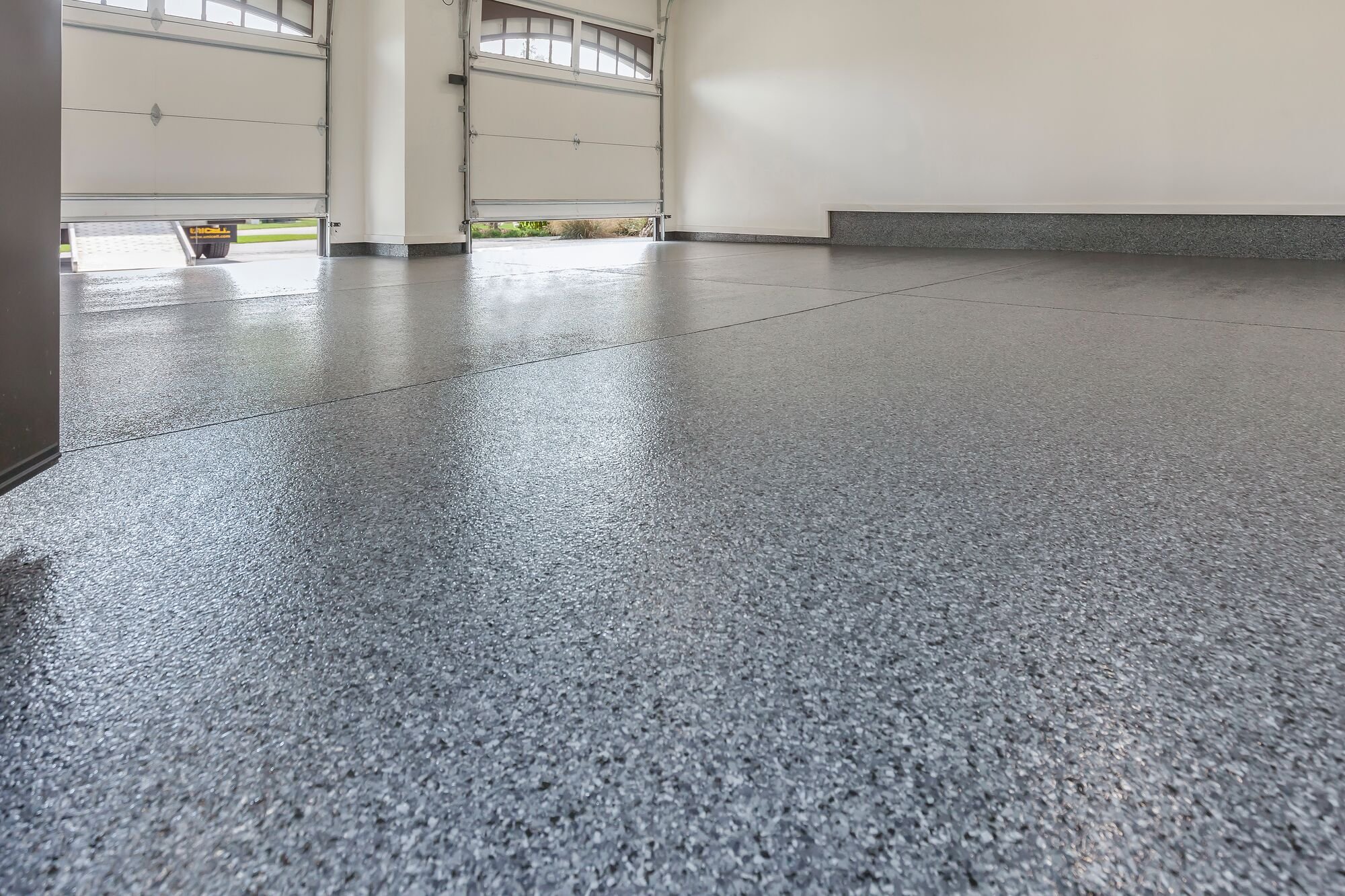 Floor coatings and interlocking tiles