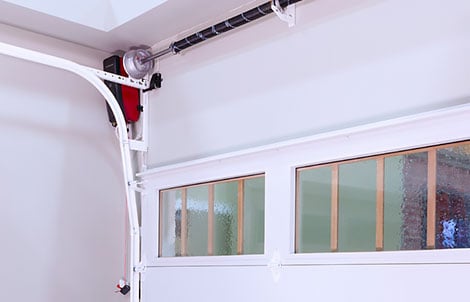 Alternate track path similar to that of a high lift garage door conversion - Garage Living